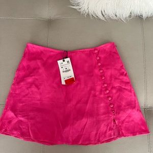 Satin Skort with buttons by Zara in pink color.